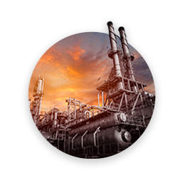 Oil refinery on the sunset background