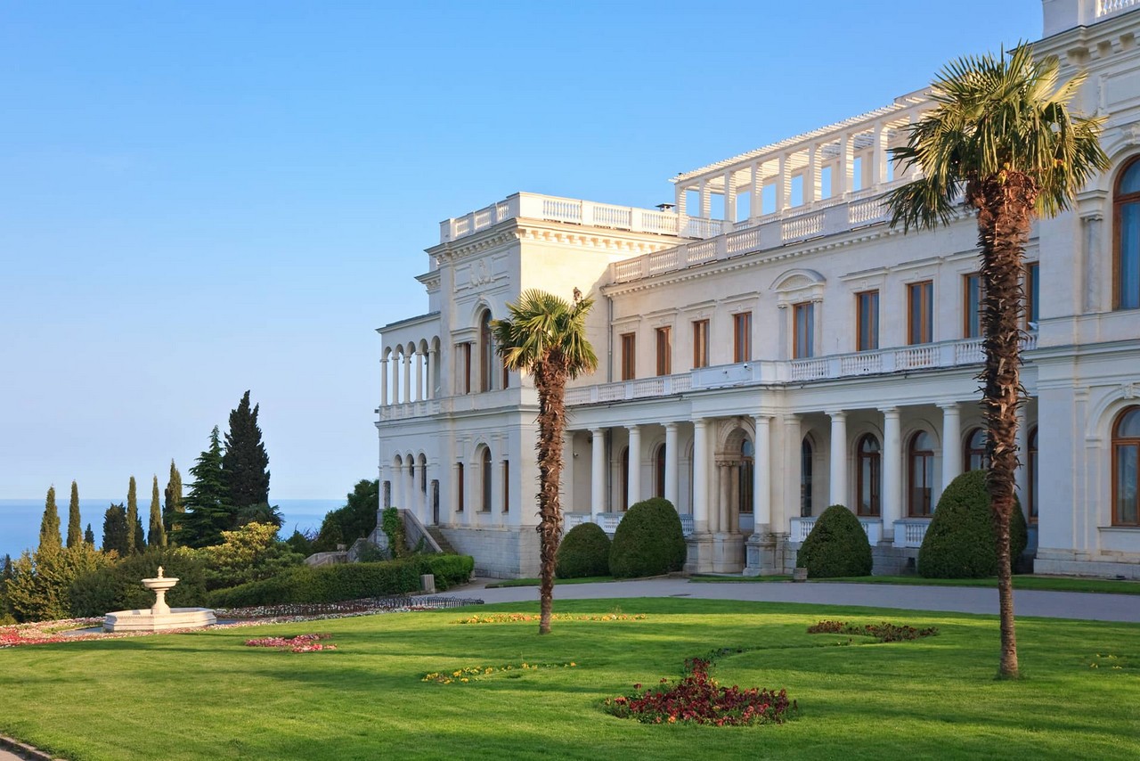 The palace built of white Crimean limestone in the Neo-Renaissance style, palace in Italian style with portico, a garden with a fountain in front of the palace