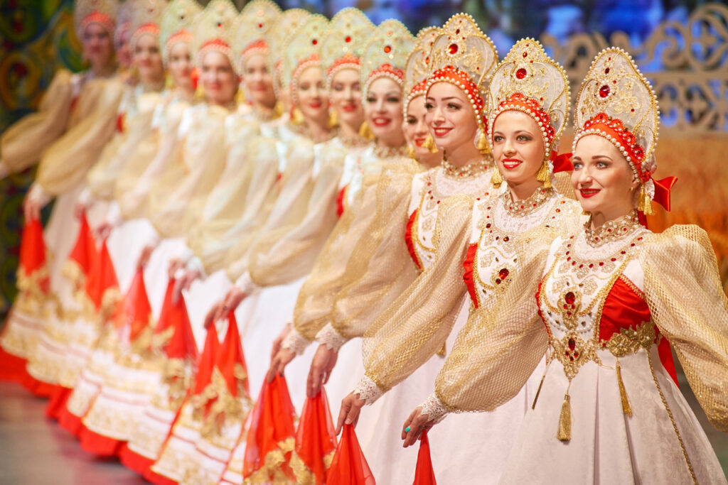 A Russian folk dance ensemble, women wearing traditional Russian clothes and kokoshniks