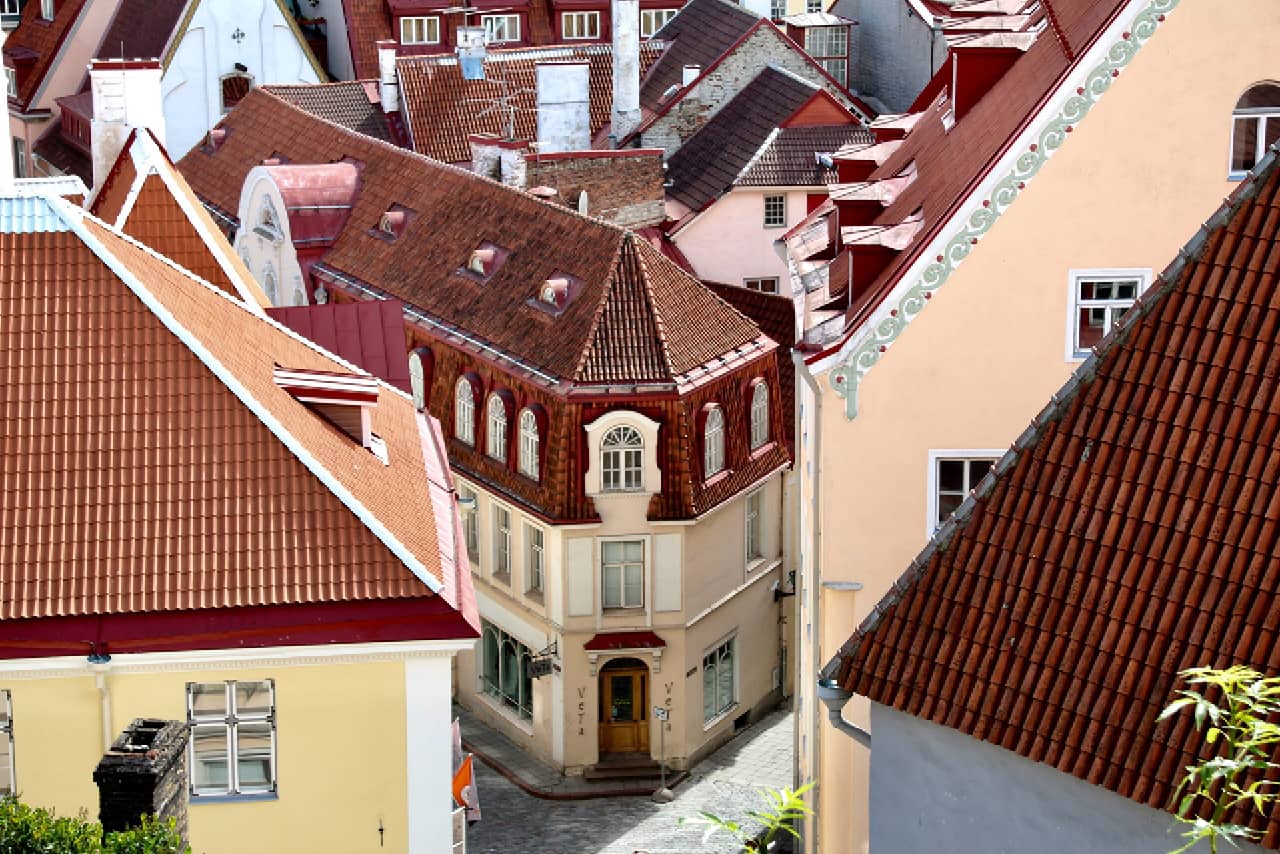 A view from the air of old buildings and narrow cobblestone streets