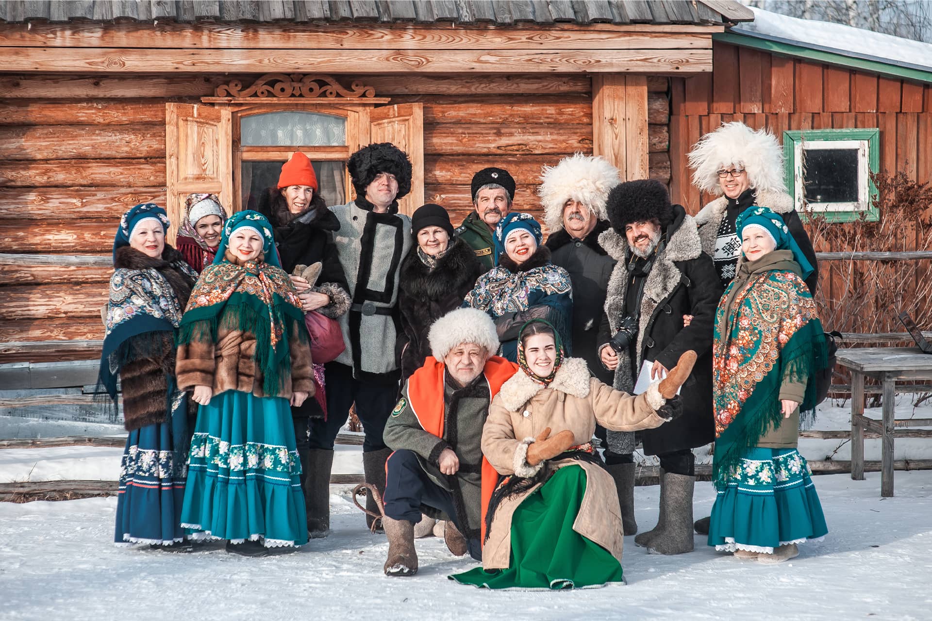 A group of people wearing Russian folk clothes