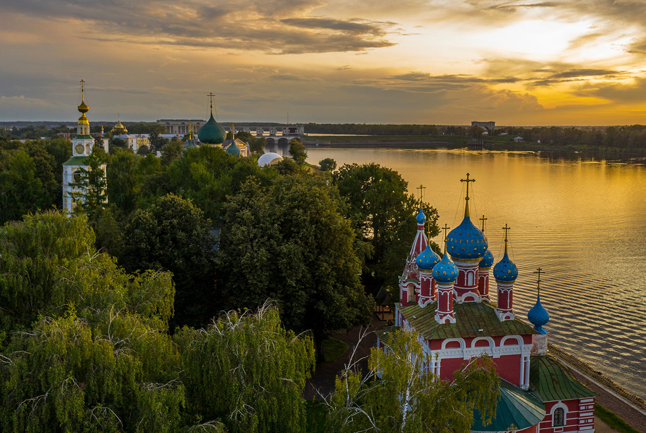 Uglich, Russia. Embankment of the Volga river in Uglich, the temple of Dmitry on Blood at sunset, view from the quadcopter